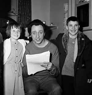 Ken Dodd in his dressing room at the Palladium with children. 13th December 1965 Ken Dodd in his dressing room at the Palladium with children. 13th December 1965