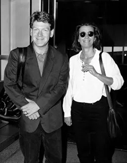 Images Dated 22nd July 1991: Kenneth Branagh Actor and actress wife Emma Thompson leave Heathrow Airport to fly to Los