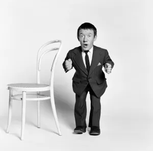 Images Dated 12th December 1977: Kenny Baker, actor who plays robot character R2-D2 in new science fiction film, Star Wars