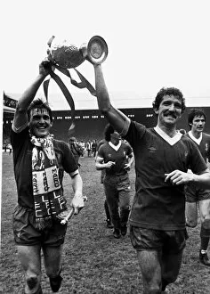 Kenny Dalglish with Graeme Souness proudly holding aloft League Championship trophy at