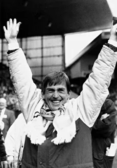 Kenny Dalglish manager Liverpool FC with arms in the air raised scarf around neck Kenny Dalglish manager Liverpool FC with arms in the air raised scarf around neck