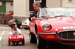 Images Dated 15th April 1998: Kerri Duncan in Toy E type Jaguar car April 1998, parked alongside Graeme Moyes principal