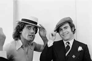 Images Dated 18th September 1978: Kevin Keegan in a straw boater hat and Elton John in his own hat