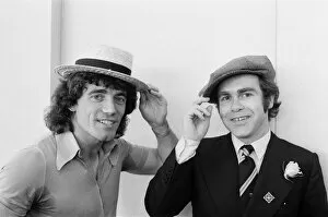 Images Dated 18th September 1978: Kevin Keegan in a straw boater hat and Elton John in his own hat