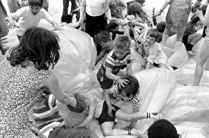 Images Dated 20th June 1970: Kids in the Park: It was shoes off in Tabbard Gardens, Bermondsey, today (Saturday)