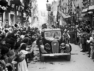 King George VI cheered by waving crowds on the streets of Valetta as he visits King George VI cheered by waving crowds on the streets of Valetta as he visits