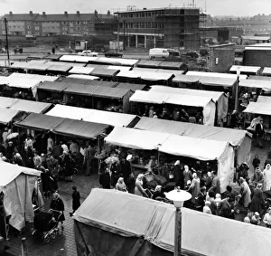 Kirkby's town market at a time when it was crowded with shoppers. 26th April 1961 Kirkby's town market at a time when it was crowded with shoppers. 26th April 1961