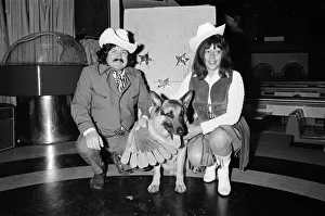 A knife throwing act which uses a dog as part of its show. 1972 A knife throwing act which uses a dog as part of its show. 1972