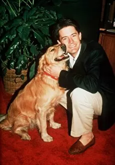 Images Dated 1st May 1991: Kyle Maclachlan actor with Golden Retriever dog 1991