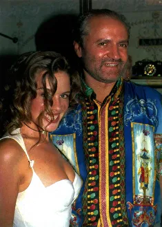 Kylie Minogue the singer and actress with designer Gianni Versace at the opening of his Kylie Minogue the singer and actress with designer Gianni Versace at the opening of his