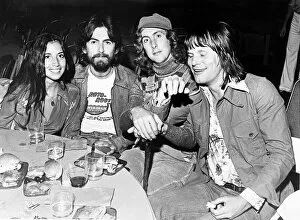 Images Dated 18th July 1975: L-R Olivia Arias, Former Beatle George Harrison, Eric Idle