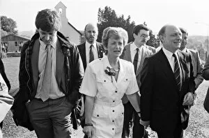 Images Dated 11th June 1987: Labour leader Neil Kinnock and his wife Glenys go to cast their vote in the 1987 general
