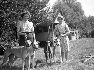 00137 Gallery: Two ladies at Flatford Mill Suffolk where Constable painted the Haywain East Anglia