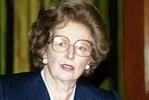 Lady Margaret Thatcher wearing glasses