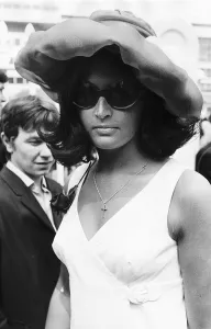 Lady in puffed hat and sunglasses at Royal Ascot in June 1968 Sixties fashion Lady in puffed hat and sunglasses at Royal Ascot in June 1968 Sixties fashion