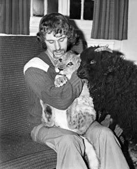 Lamb and Lion and Safari Warden Ken Lawrence. December 1974 74-7586-003