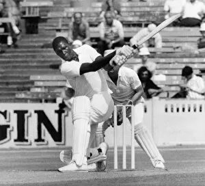 Lancaster. vs. Somerset. Joel Garner hits the ball out of the ground at Old Trafford with