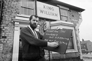Images Dated 1st January 1972: Landlord of the King William pub in Shildon, County Durham, puts a blackboard up. 1972