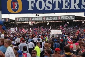 A large crowd celebrating July 1992 after Nigel Mansell had won the British Grand