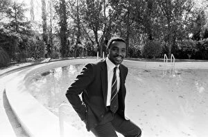 Images Dated 5th December 2012: Laurie Cunningham poses for the camera near swimming pool Madrid Spain