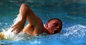 Images Dated 24th August 1991: Lazio and England footballer Paul Gascoigne swimming in a pool in Rome as he battles to