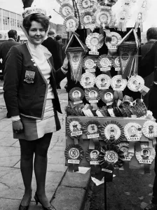 Leeds United supporter Mrs Barbra Pewte seen here standing beside a rosette stall outside Leeds United supporter Mrs Barbra Pewte seen here standing beside a rosette stall outside