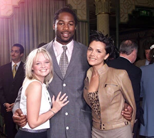Images Dated 20th May 1999: Lennox Lewis boxer is pictured with the Spice Girls May 1999 Emma Bunton