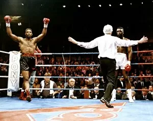 Lennox Lewis Boxing Heavyweight Boxer raises his arms in triumph after defeating Derek