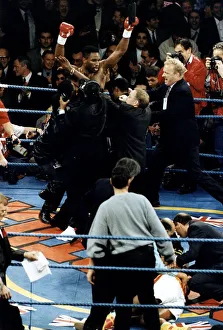 Lennox Lewis Boxing Heavyweight Boxer surrounded by his corner men Lennox Lewis Boxing Heavyweight Boxer surrounded by his corner men