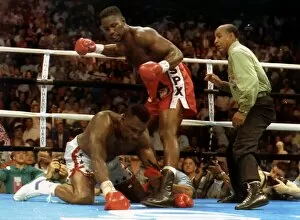 Images Dated 8th May 1993: Lennox Lewis British Heavyweight champion in action to defeat challenger Tony Tucker in