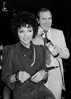 Leonard Rossiter actor with Joan Collins stars of the Cinzano TV commercials at Leonard Rossiter actor with Joan Collins stars of the Cinzano TV commercials at