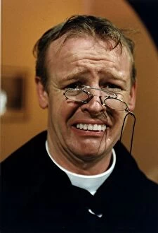 Images Dated 31st December 1990: Les Dennis Comedian and TV presenter in one of his comedy roles as a vicar