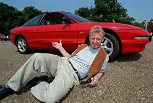 Images Dated 11th December 1997: Les Dennis Comedian / TV Presenter December 97 Layingon ground show of the new Ford