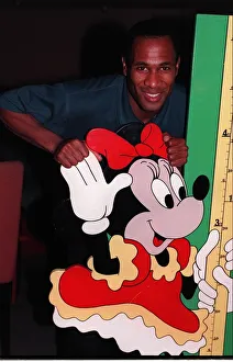 Les Ferdinand Football with cardboard cut out of Minnie Mouse cartoon character Les Ferdinand Football with cardboard cut out of Minnie Mouse cartoon character
