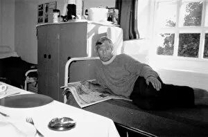 Images Dated 1st January 1988: Lester Piggott jockey prison cell Highpoint Open prison lying on bed reading newspaper