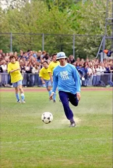 Images Dated 12th May 1996: Liam Gallagher kicking football - May 1996 Oasis and Blur come head to head in