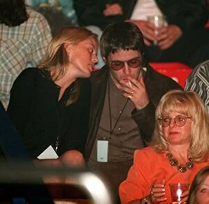 Images Dated 18th May 1997: Liam Gallagher of Oasis and his wife model Patsy Kensit watch The Who concert in Wembley