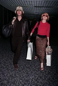 Images Dated 2nd July 1998: Liam Gallagher Singer July 98 Arriving at heathrow airport with his wife actress