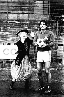 Images Dated 29th February 1984: Lib - Football legend George Best giving actress Gudrun Ure some footballing tips during
