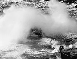 Lifeboat being launched at Tenby Lifeboat Launch Station, South Wales. 17th November 1993 Lifeboat being launched at Tenby Lifeboat Launch Station, South Wales. 17th November 1993