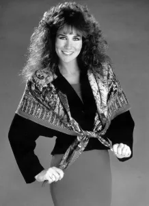 Images Dated 6th March 1989: Linda Lusardi Model Ex Page 3 girl wearing a scarf over a jumper and a skirt