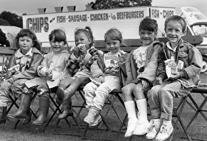 Six little charmers take a break for a snack and to rest their legs at the second day of Six little charmers take a break for a snack and to rest their legs at the second day of