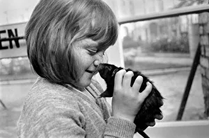 Little girl holding a rat. November 1969 Z10521-001 Little girl holding a rat. November 1969 Z10521-001