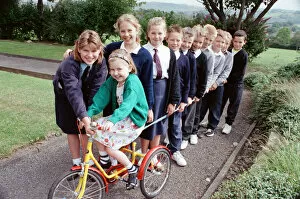 Images Dated 11th July 1990: With a little help from my friends... 10-year-old Katy Hardaker is pictured with friends
