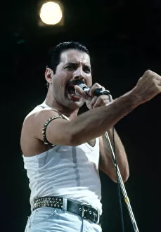 Live Aid concert at Wembley Stadium. Queen lead singer Freddie Mercury on stage