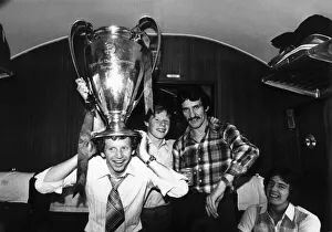 Liverpool FC player David Fairclough with the European cup on his head on the train Liverpool FC player David Fairclough with the European cup on his head on the train
