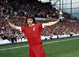 Images Dated 1st August 1972: Liverpool footballer Kevin Keegan shows off his Best Youngster of the Year Award before a