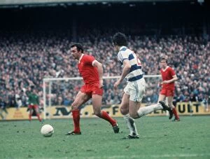 Images Dated 7th May 1977: Liverpool footballer Ray Kennedy running with the ball during the League Division One
