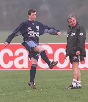 Images Dated 26th March 1996: Liverpool footballer Robbie Fowler watched in training by England manager Terry Venables