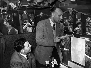 Liverpool goalkeeper Cyril Sidlow (seated) and right back Ray Lambert answer the urgent Liverpool goalkeeper Cyril Sidlow (seated) and right back Ray Lambert answer the urgent